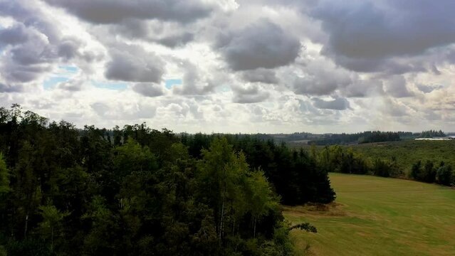 Side-moving rising aerial shot over Willamette Valley, Oregon Farmland, Near Silverton