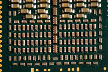 Close-up detail of the pins of a CPU central processing unit, semiconductors, socket, core, package