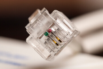 Close detail of an ethernet head, ethernet network cable, ethernet socket. Concept of internet, wold wide web and interconnected world