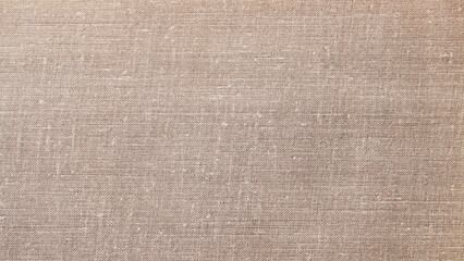 Fototapeta na wymiar Jute hessian sackcloth canvas woven texture, pattern background in light brown color
