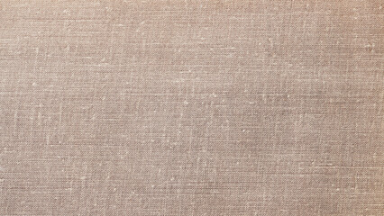 Jute hessian sackcloth canvas woven texture, pattern background in light brown color