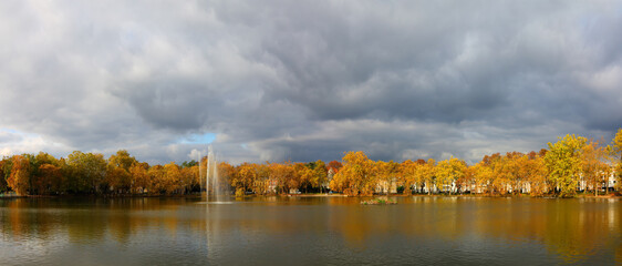 Old Benrath Park - Germany, Dusseldorf. Autumn landscape with pond and fountain