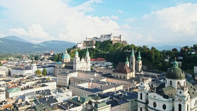 aerial drone panorama of Salzburg city in Austria. View of the historic city of Salzburg and Salzach river at summer.