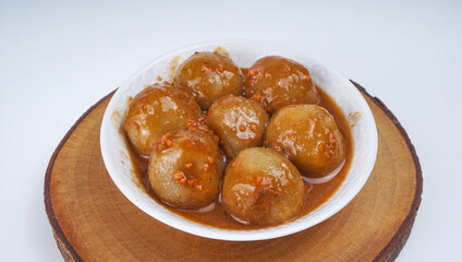 Cilok is a typical West Javanese food made from springy tapioca with additional spices such as soy sauce, and sauce.