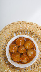 Indonesian Street Food Cilok, served in white plate. Top View