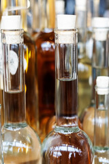 Close-up of neck of a bottle of alcoholic beverages.