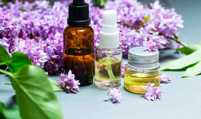 Fototapeta na wymiar Lilac flowers aroma oil, flowers essential oil, pure essence