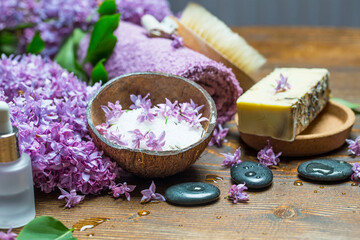 Lila spa setting with natural soap and pure essential oil - 568562899