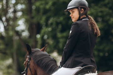 Rider in action on a dressage horse. An abstract shot of a horse during a competition.Lovely girl...