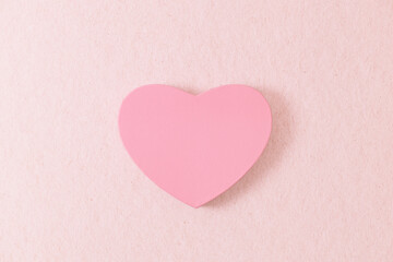 Fototapeta na wymiar One heart gift box on a pink background.