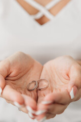 Bride and groom holding in hands. Married couple rings weeding love hands.