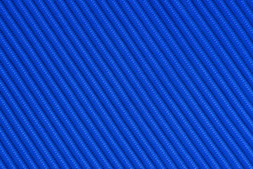 Blue textile material with diagonal stripes full frame background