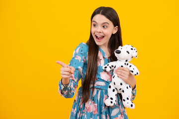 Excited face. Cheerful teen child hold toy. Happy childhood. Kid playing toy. Childcare concept. Amazed expression, cheerful and glad.