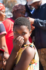 Obraz premium African girl hiding face