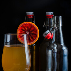 Homemade kambucha with blood orange garnish