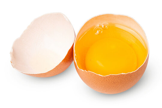 Egg. Brown eggs. Half an egg with yellow yolk. Organic raw non boiled chicken eggs. Brown eggshell. Farm bird product. Good for breakfast, cooking recipe. Food photography. White isolated background.