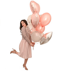 a woman with balloons celebrates holiday