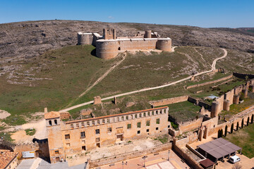 Bird's eye view of town and castle of Berlanga de Duero in province of Soria, Spain. - obrazy, fototapety, plakaty