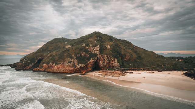 External view of Gruta das Encantadas, attached to Morro da Gruta located in Praia das Encantadas