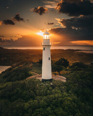 Ilha do Mel - Paraná. Aerial view of the Conchas lighthouse and beaches of Ilha do Mel © Thiago