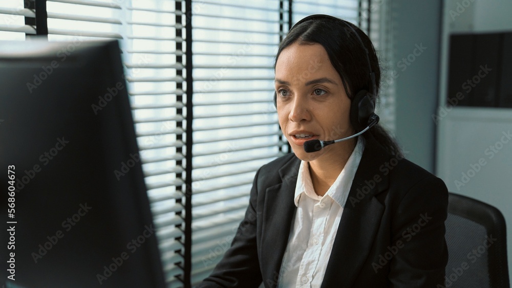 Aufkleber competent female operator working on computer and talking with clients. concept relevant to both cal