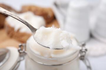 Spoon with delicious pork lard, closeup view