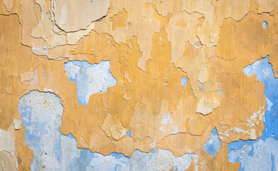 Peeled orange and blue color wall, background concept. Copy space.
