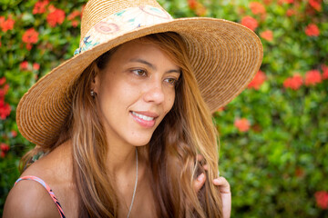 portrait of a woman in a straw hat