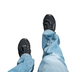 Top view of woman walking, with jeans and sport shoes. Isolated.