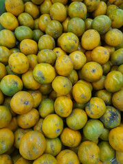 fresh oranges collected and put in one place for sale