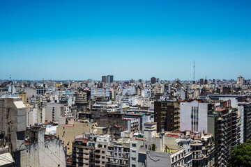 Obraz premium Building with offices and homes in Buenos Aires, Argentina aerial view blue sky -June 2021
