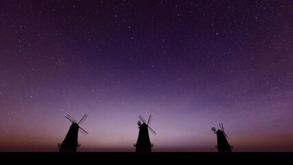 silhouette of a windmill