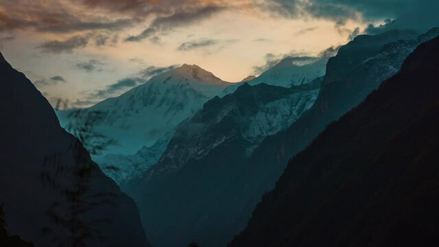 Time lapse of the sunrise over the mountain landscape of the Himalayas.