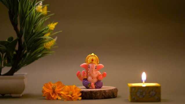Handcrafted ganpati murti, happy ganesh chaturthi, peace video, god of ganesh ,meditation video ganpati bappa with candel short clip full hd 4k