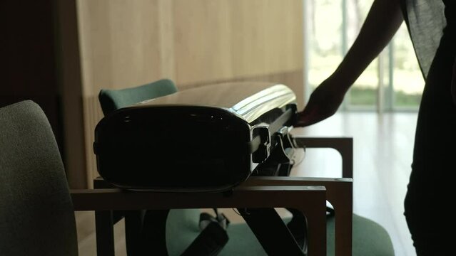 opening of a violin case with high contrast and dramatic look in slomotion 4k