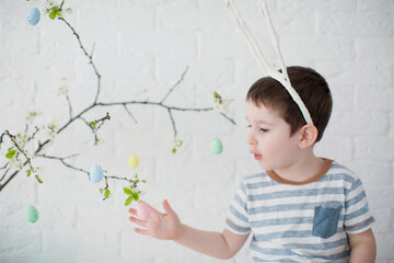 Caucasian boy with funny bunny ears