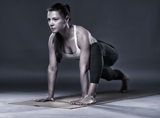 Woman in Kapotasana pose