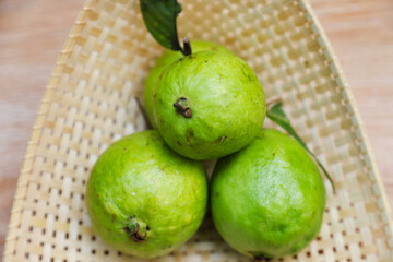 Some fresh guava on bamboo tray