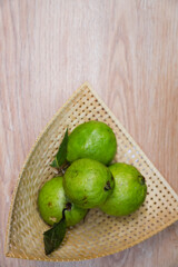Some fresh guava on bamboo tray