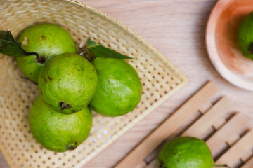 Some fresh guava on bamboo tray