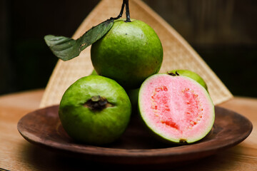Some fresh guava on bamboo tray