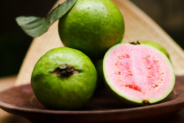 Some fresh guava on bamboo tray