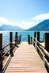 Wooden pier, mountains and lake, Lake Atitlan Guatemala