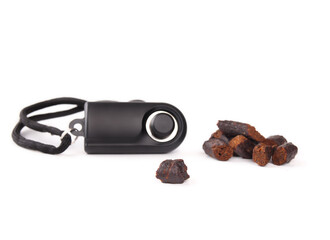 Dog training treats and dog clicker for obedience training. Defocused training clicker. Make click...
