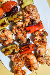 kebabs with chicken and vegetables on a skewer