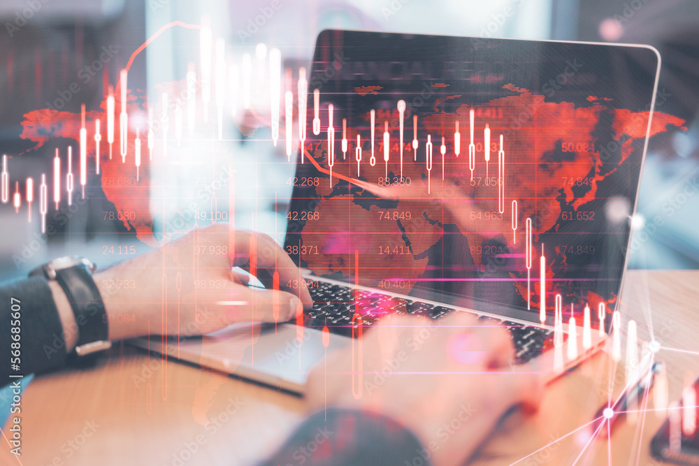 Poster Close up of hands using laptop computer keyboard with glowing falling red forex chart on blurry background. Stock exchange and crisis concept. Double exposure.