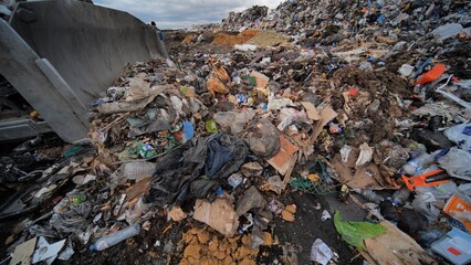 Work of a bulldozer at a landfill.