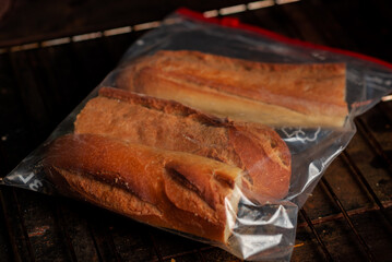French baguette in a zip bag. Bread storage, freezing.