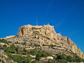 castle of saint barbara in alicante spain against blue sky landmark