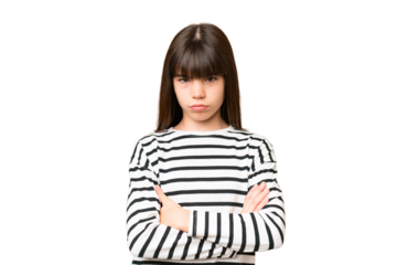Little caucasian girl over isolated background with unhappy expression